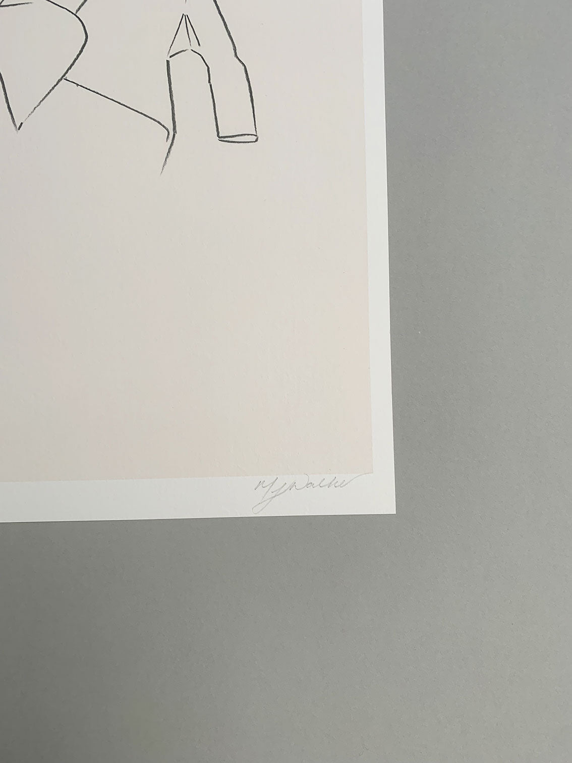 Melanie Walker's signature on a fashion illustration of a model with a Mohawk.