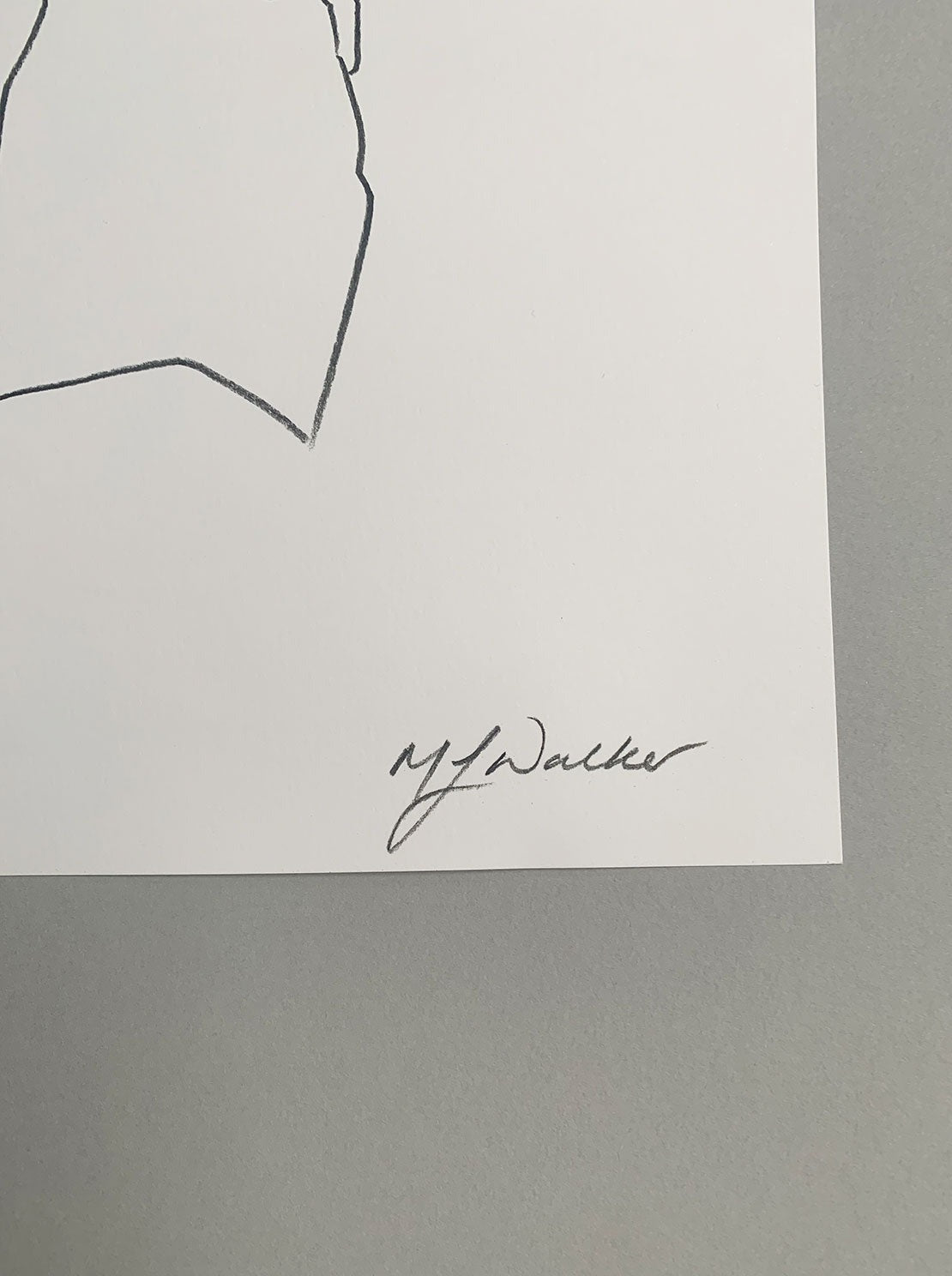 Melanie Walker's signature on a fashion illustration of a lady in a head scarf.