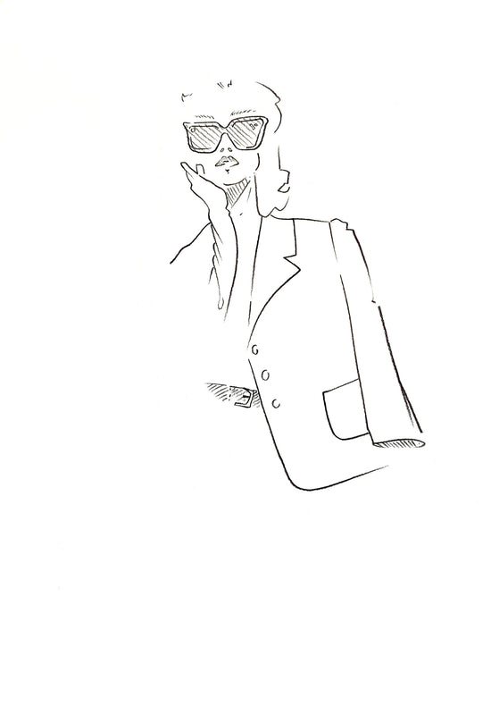 Fashion illustration in black charcoal of a lady wearing sunglasses and a coat, holding her hand close to her face. Black charcoal on white paper