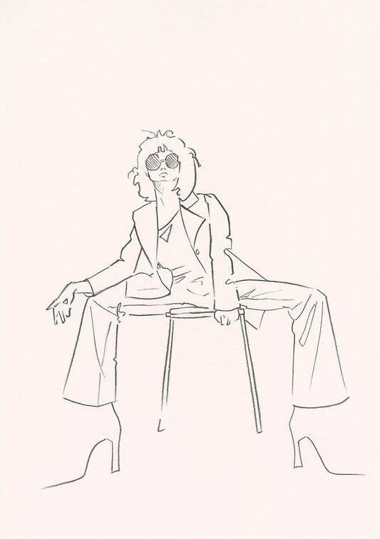 Contemporary monochrome print of a female model in a suit sitting on a stool.