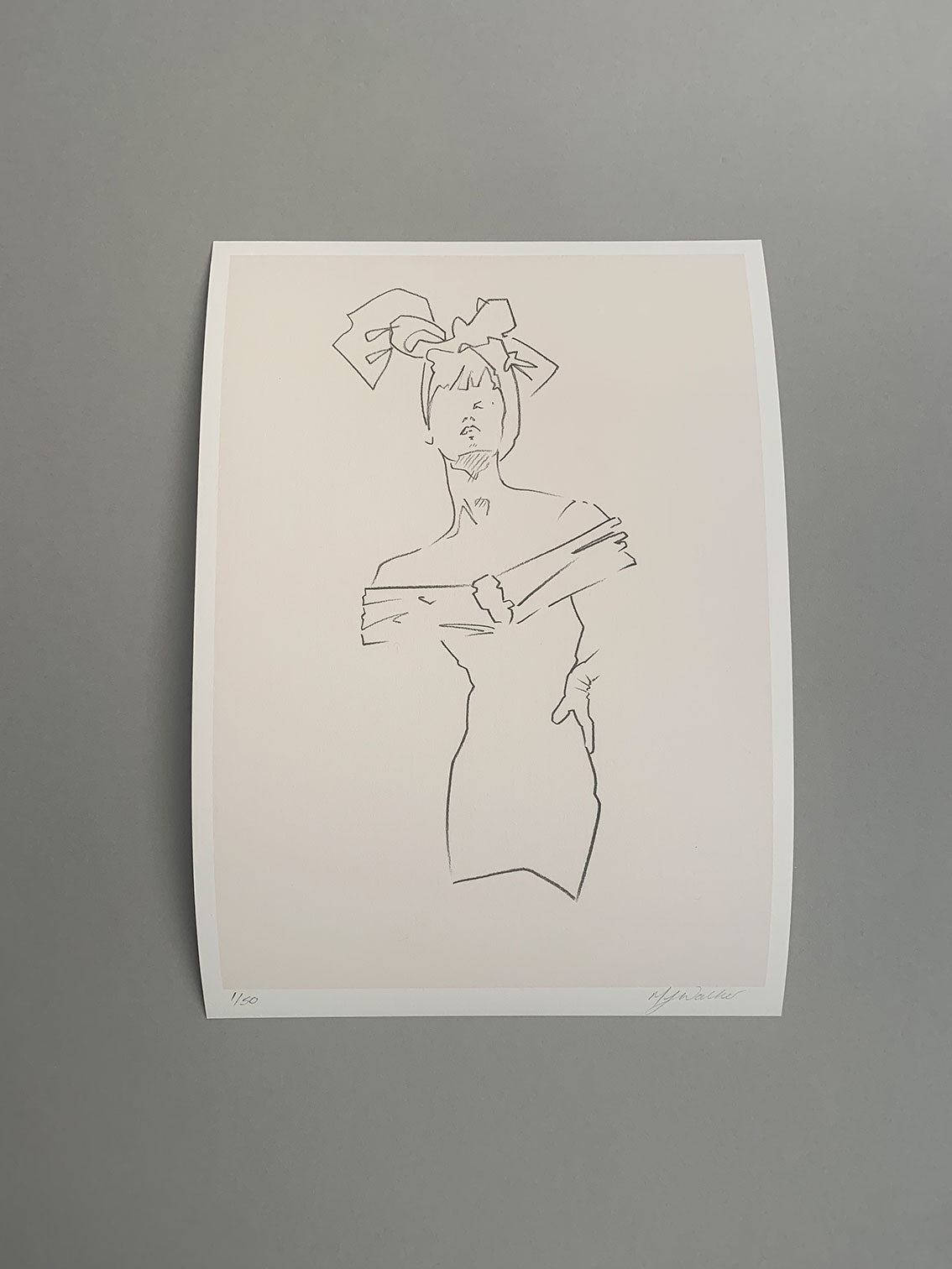 Contemporary fashion print of a lady in a headscarf on a grey background.