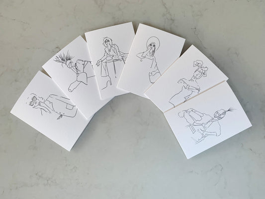 Set of 6 limited edition greeting cards with fashion illustrations on a grey background.